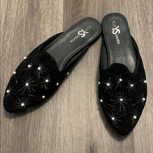 Black slip on shoes with pearl details